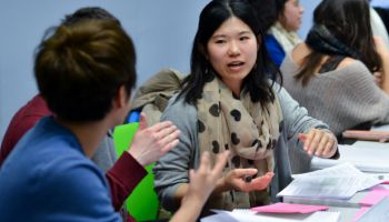 students talking on campus