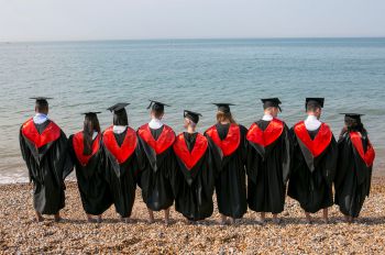 Graduates on Brighton beach