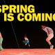Photo of performers on stage with 'Spring is coming' text