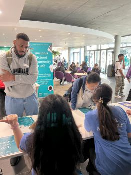Student talking to ambassadors