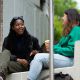 Two students chatting while having a coffee outside