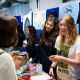 Members of the Dog Walking Society talk to freshers at Freshers Fair