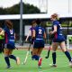 Sussex students playing hockey