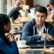 Students having a conversation over a coffee at the ACCA