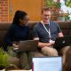 Postgraduate students studying on campus