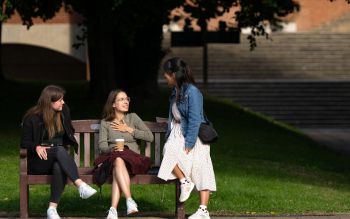 Students sitting on a bench