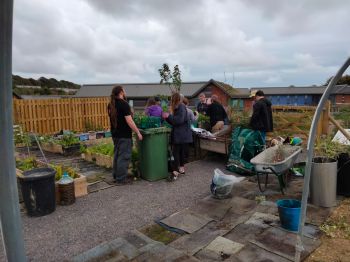 students working on the new student garden site in Northfield