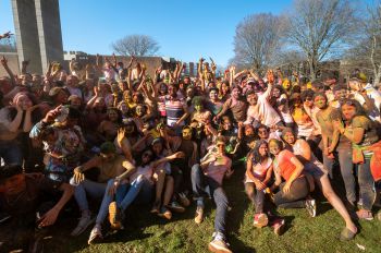 Students taking part in Holi in Library Square