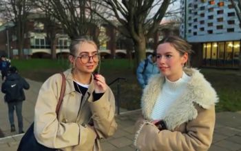 Still from embedded video of two students discussing belonging