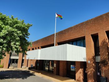 The Rainbow flag flying above Sussex House