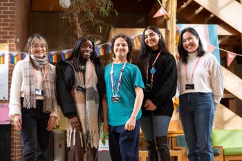 Photograph of the Race Equity Advocates stood in the foyer of Falmer House