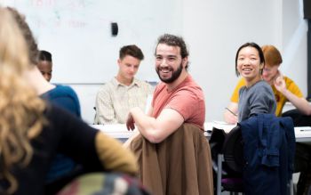 Postgraduate students enjoying a seminar