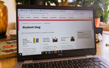 A laptop with the Student Blog open
