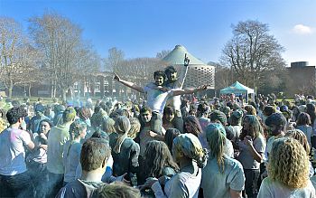 Students enjoying the Holi festival as part of One World Week on campus