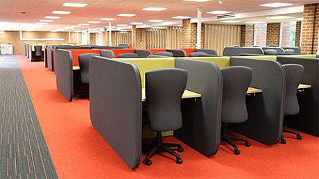 Chairs and desks in a refurbished Library study space