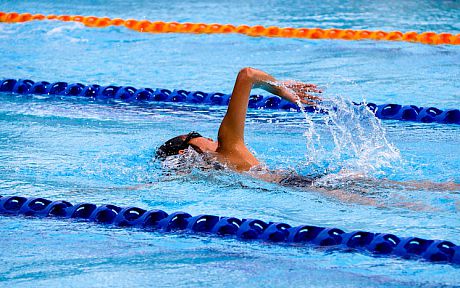 Woman swimming in pool