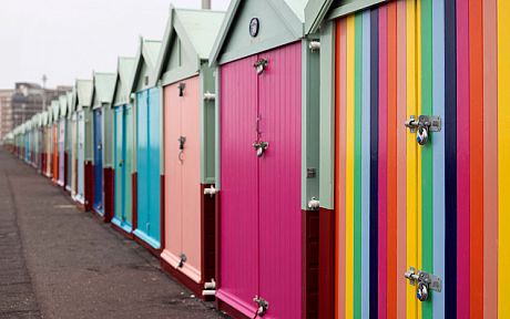 Row of colourful beach huts in Brighton