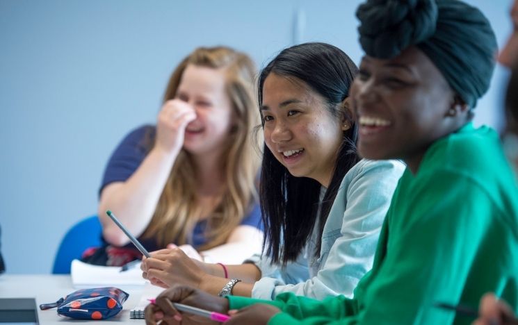 Students see the funny side during a seminar on campus