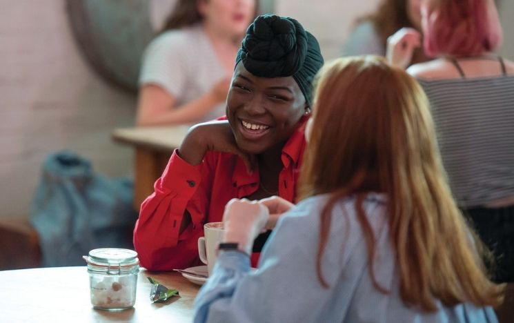 students at a cafe on campus