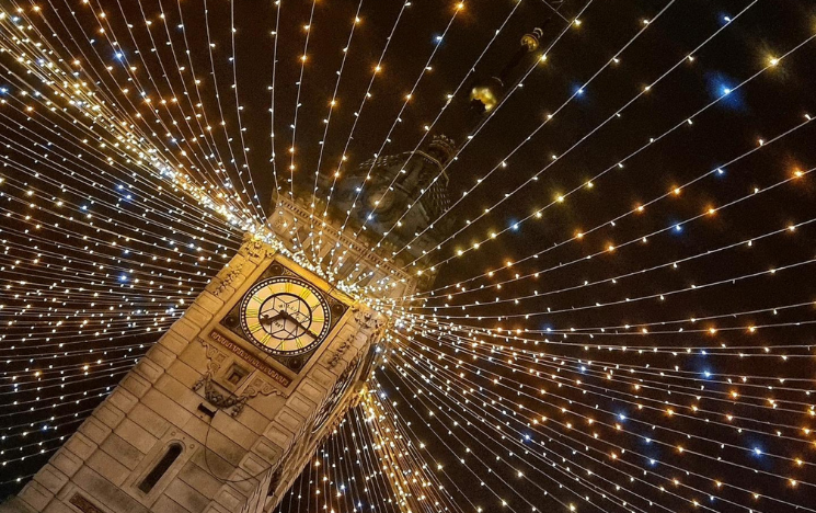 Brighton clock tower with festive lights at Christmas