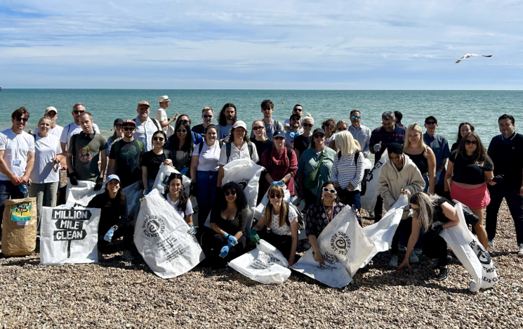 Students taking part in a beach clean