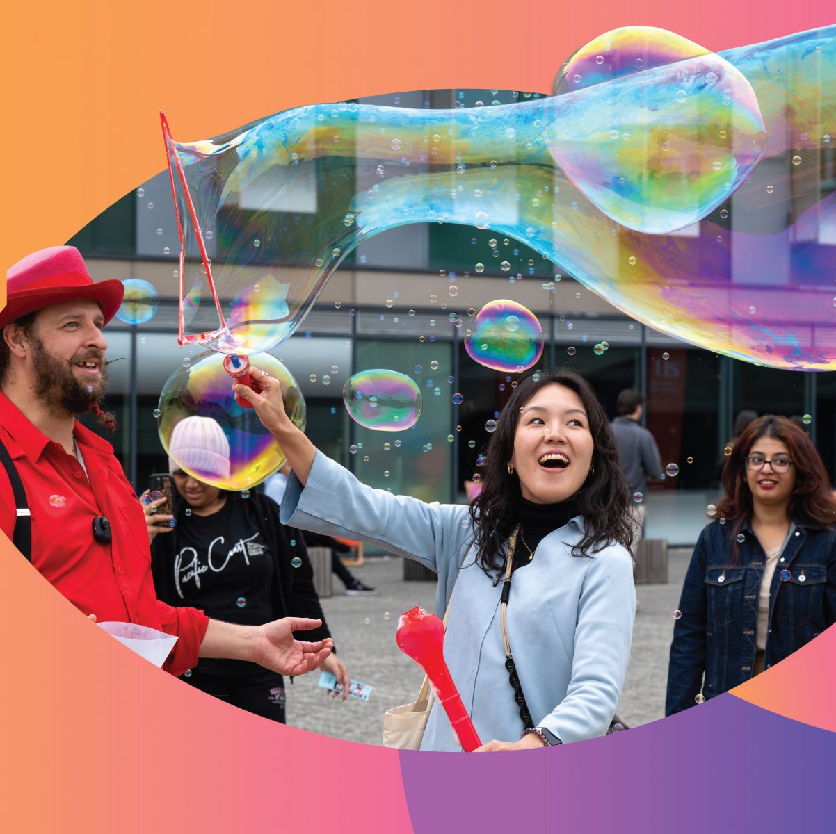 Students enjoying a giant bubble blower