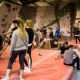 Young people in an indoor climbing centre