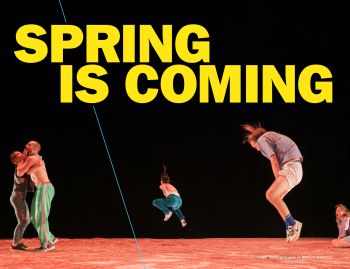 Photo of performers on stage with 'Spring is coming' text